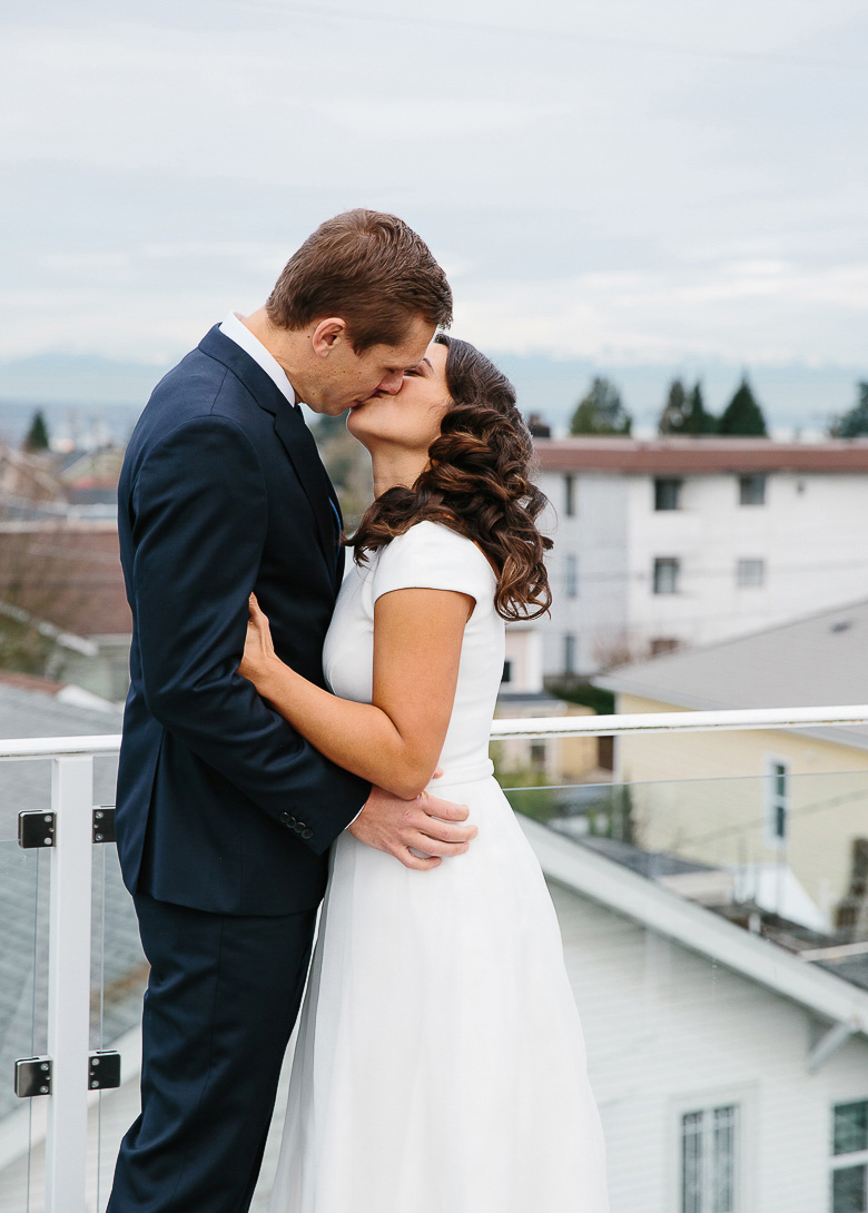 Bride and groom kissing during couple portraits on Beacon Hill 