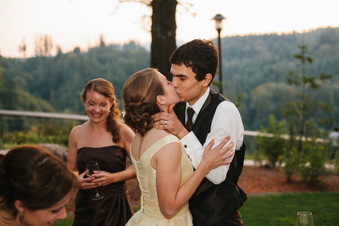 Bride and groom kissing during wedding reception at Salish Lodge in Snoqualmie WA