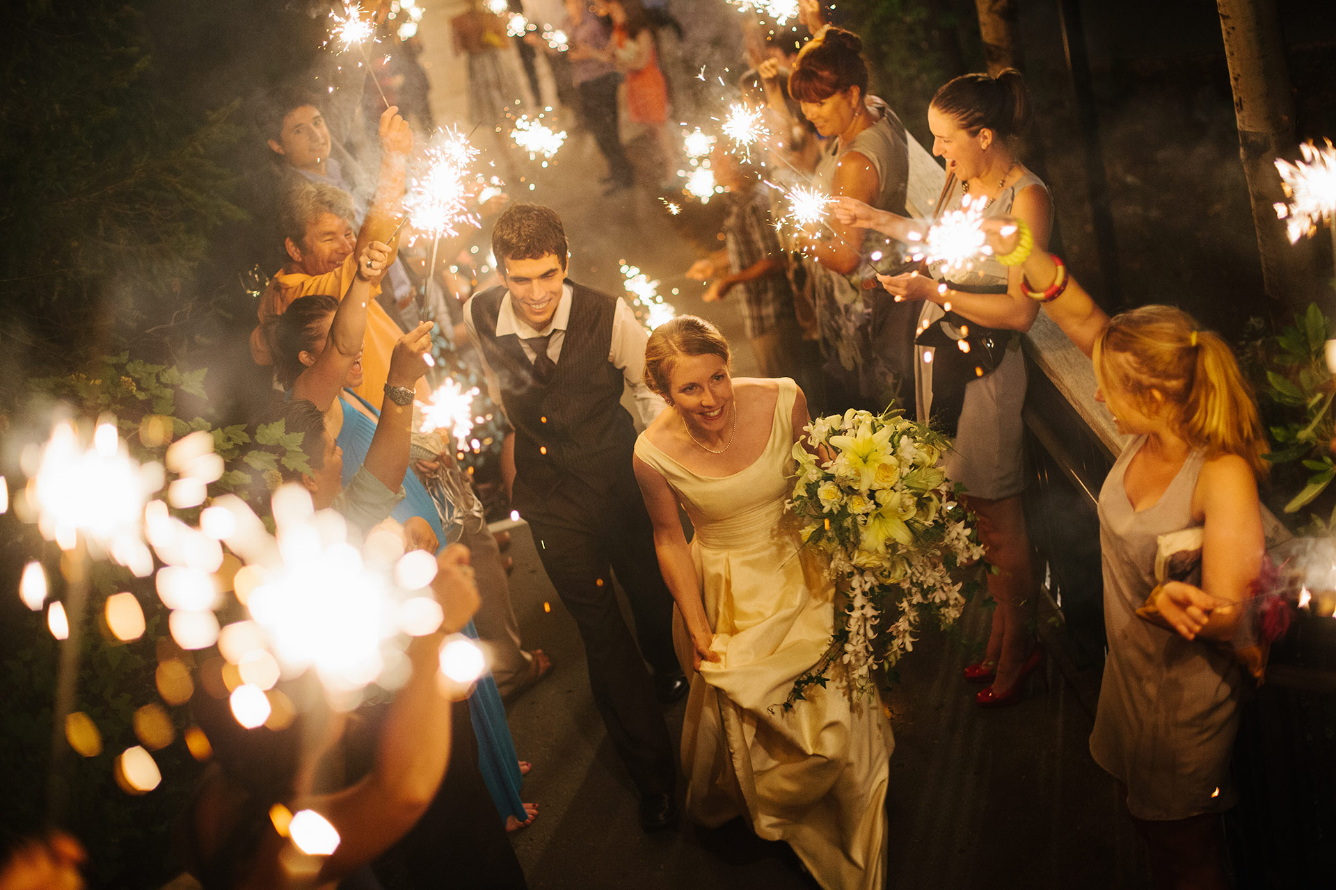 Bride during sparkler exit during wedding reception at Salish Lodge in Snoqualmie WA