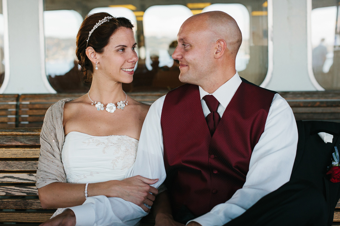 Bride and groom on Washington ferry after Whidbey Island Winery wedding
