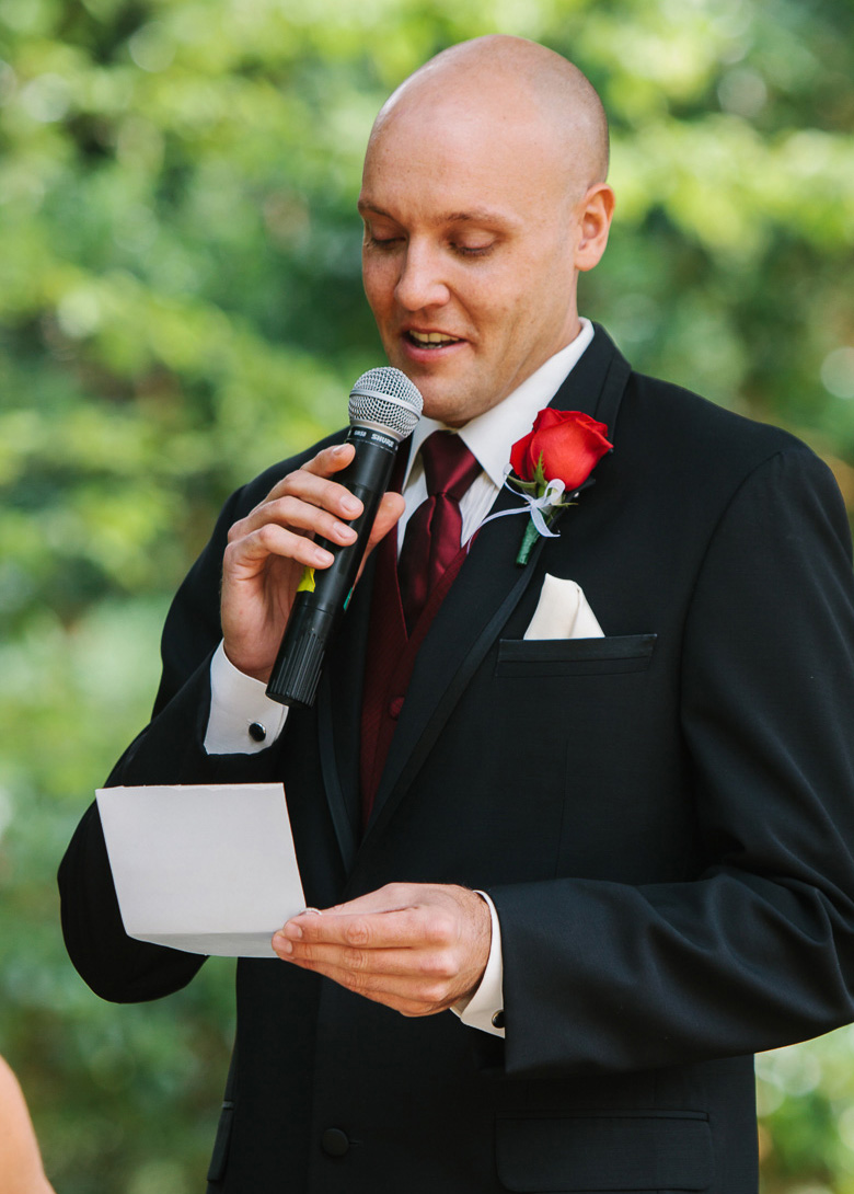 Groom saying vows during Whidbey Island Winery wedding ceremony in Washington