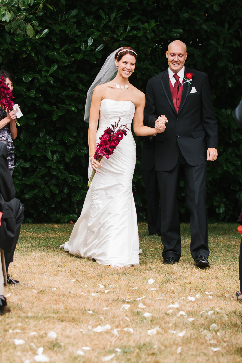 Bride and groom walking down aisle after wedding ceremony at Whidbey Island Winery