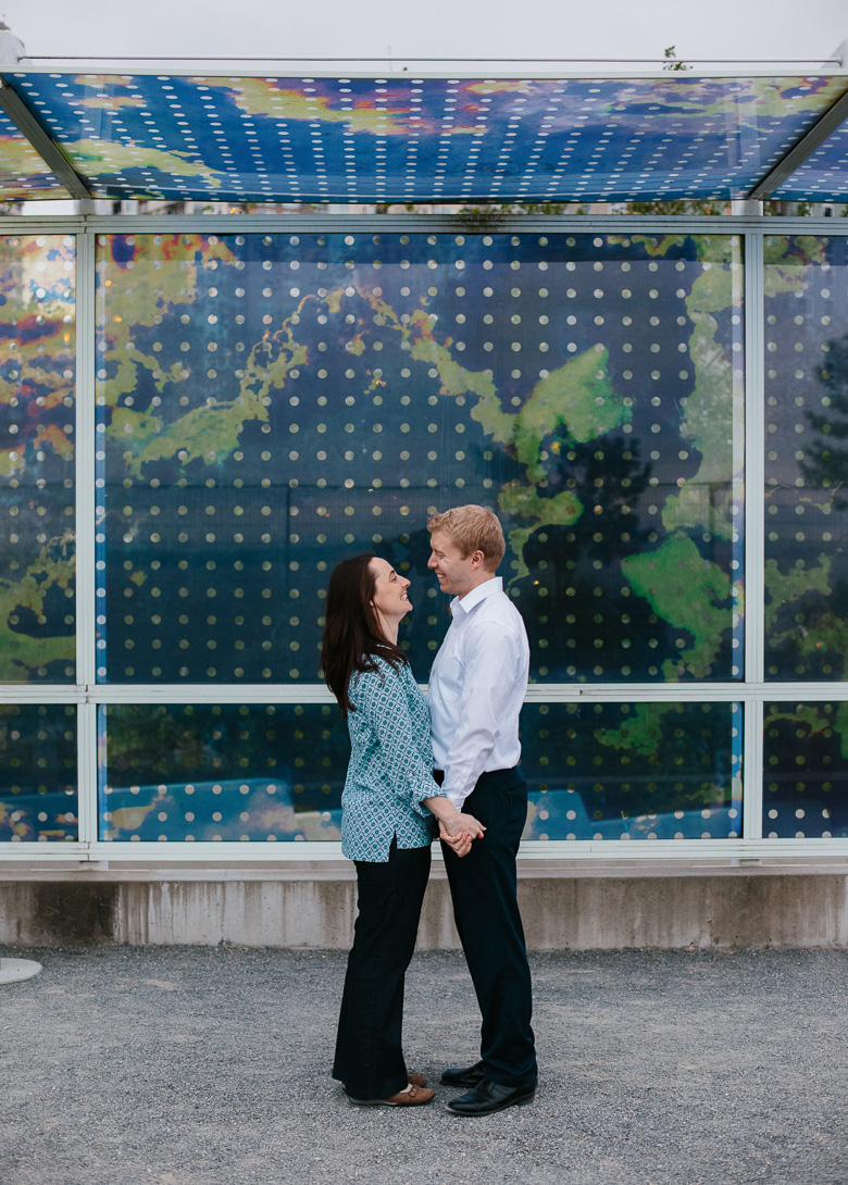 Couple during engagement photos in Olympic Sculpture Park in Seattle, WA