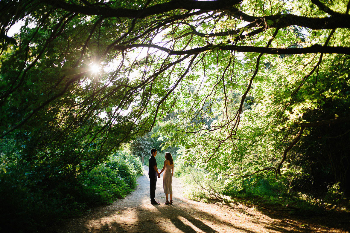 Discovery park engagement photos in the woods at sunset