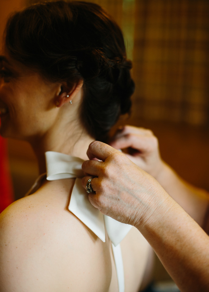 Bride getting ready before wedding ceremony at Wallace Falls in Gold Bar, WA