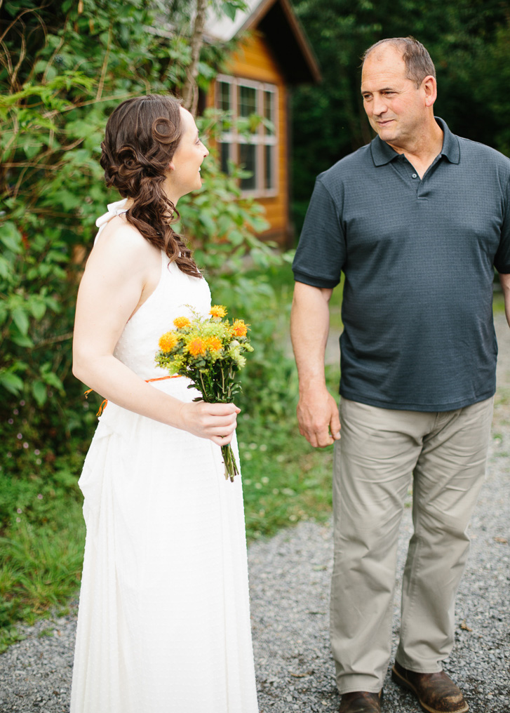 Bride and father seeing each other before wedding ceremony at Wallace Falls in Gold Bar, WA