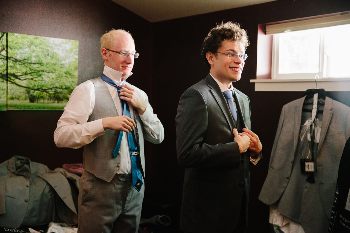 Groom and groomsmen getting rady before Fireseed Catering wedding on Whidbey Island