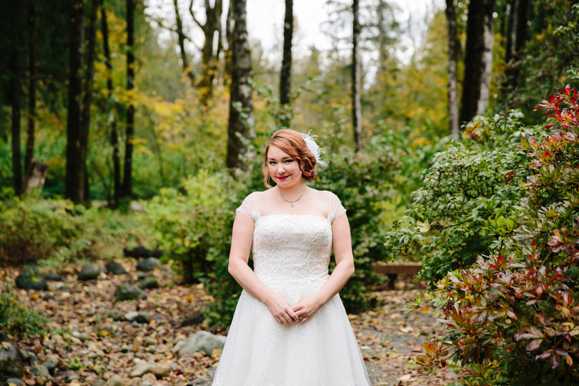 Bride during portraits before wedding at Lake Wilderness Lodge in Maple Valley, WA