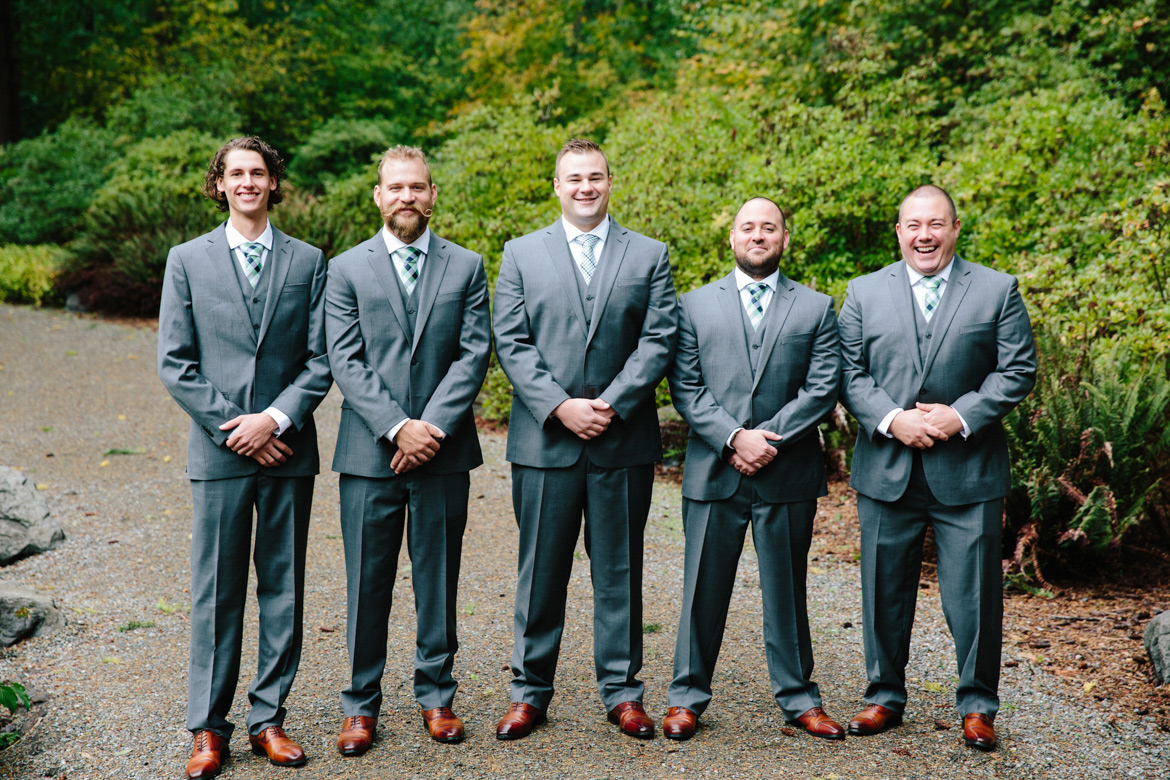 Groom and groomsmen during portraits before wedding at Lake Wilderness Lodge in Maple Valley, WA