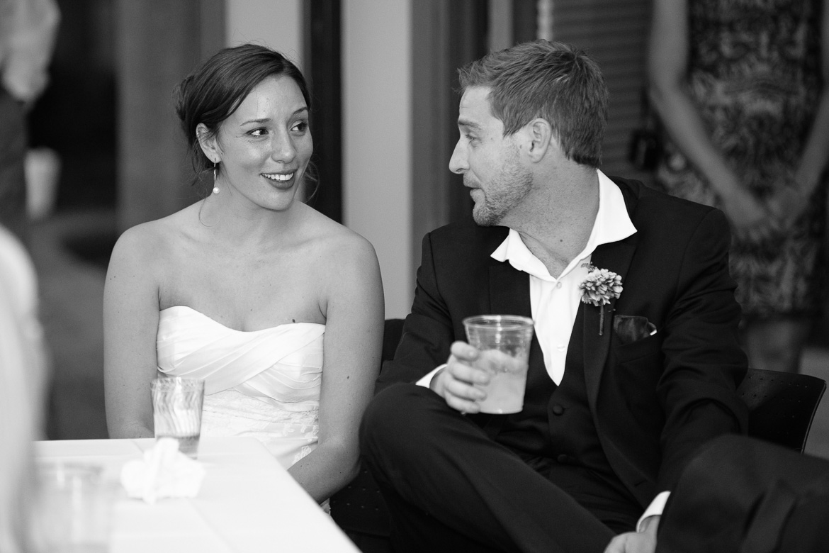 Bride and groom during toasts at wedding reception at Center for Urban Horticulture in Seattle, WA