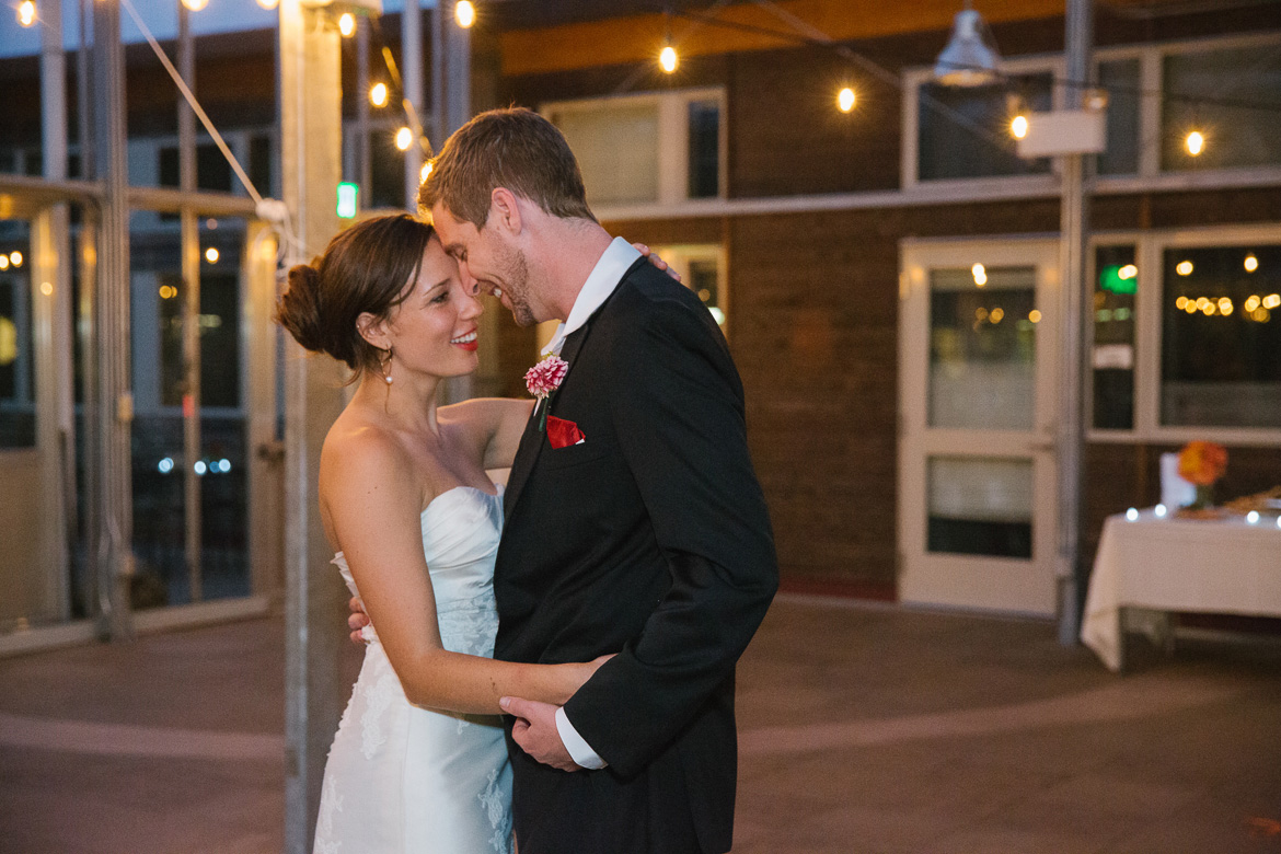 Bride and groom's first dance at wedding at Center for Urban Horticulture in Seattle, WA