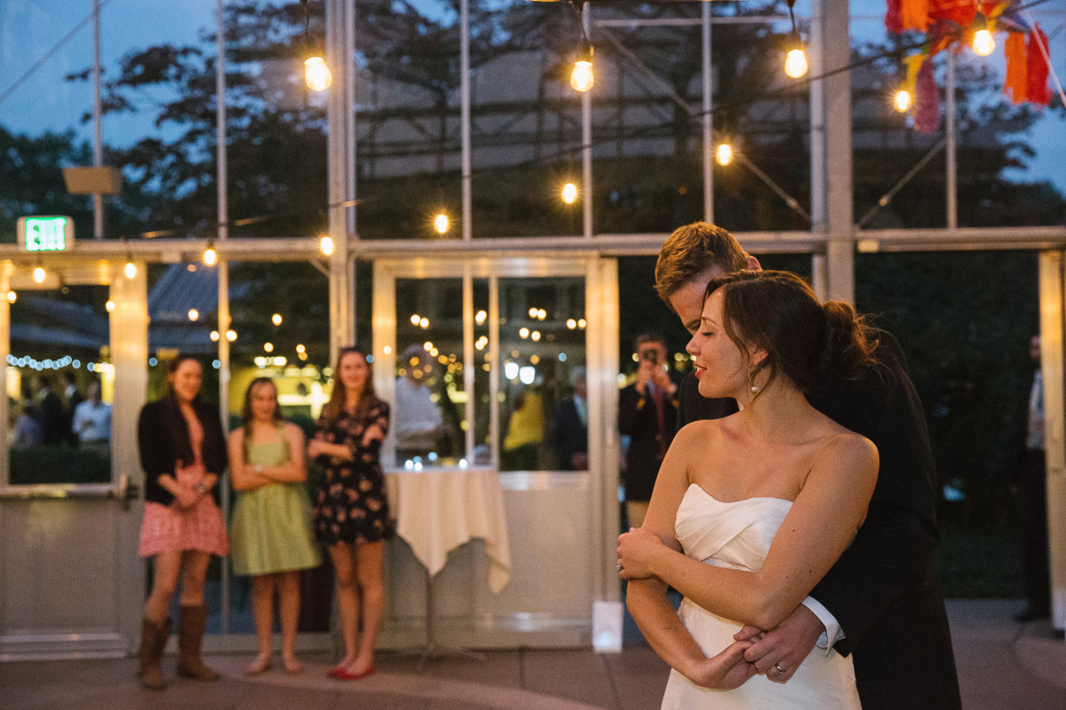 Bride and groom's first dance at wedding at Center for Urban Horticulture in Seattle, WA