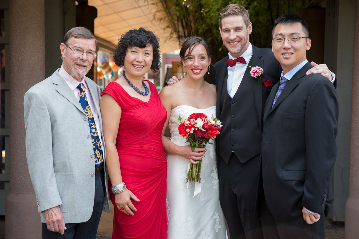 Bride and groom with family before wedding at Seattle Center for Urban Horticulture