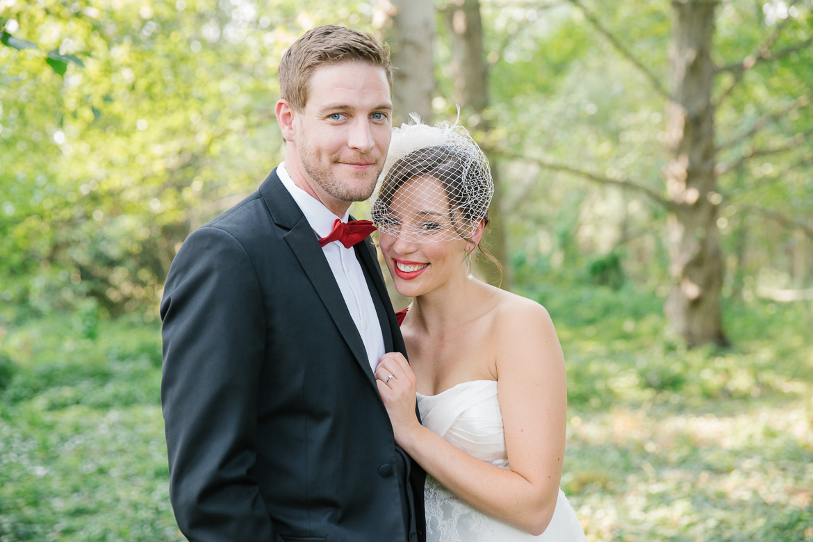 Bride and groom portrait in woods before wedding at Seattle Center for Urban Horticulture