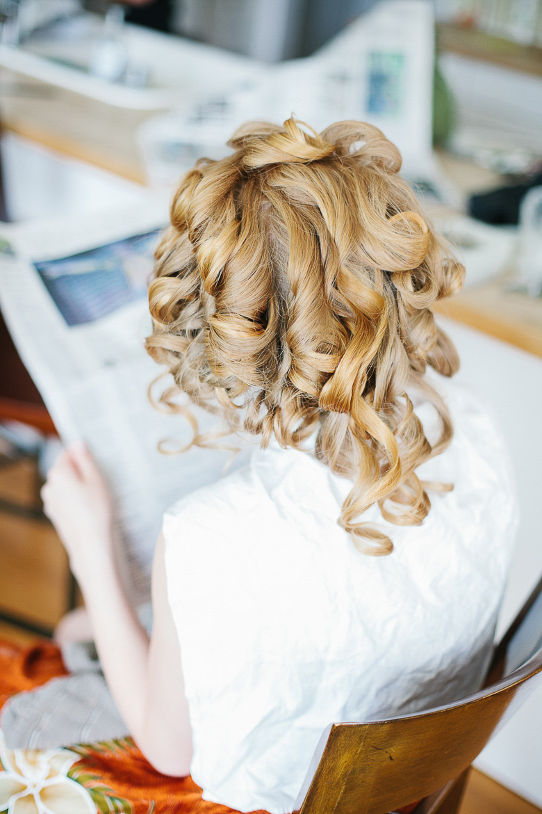  Bride getting ready for her Hubbard Park Lodge Milwaukee wedding during photography timeline
