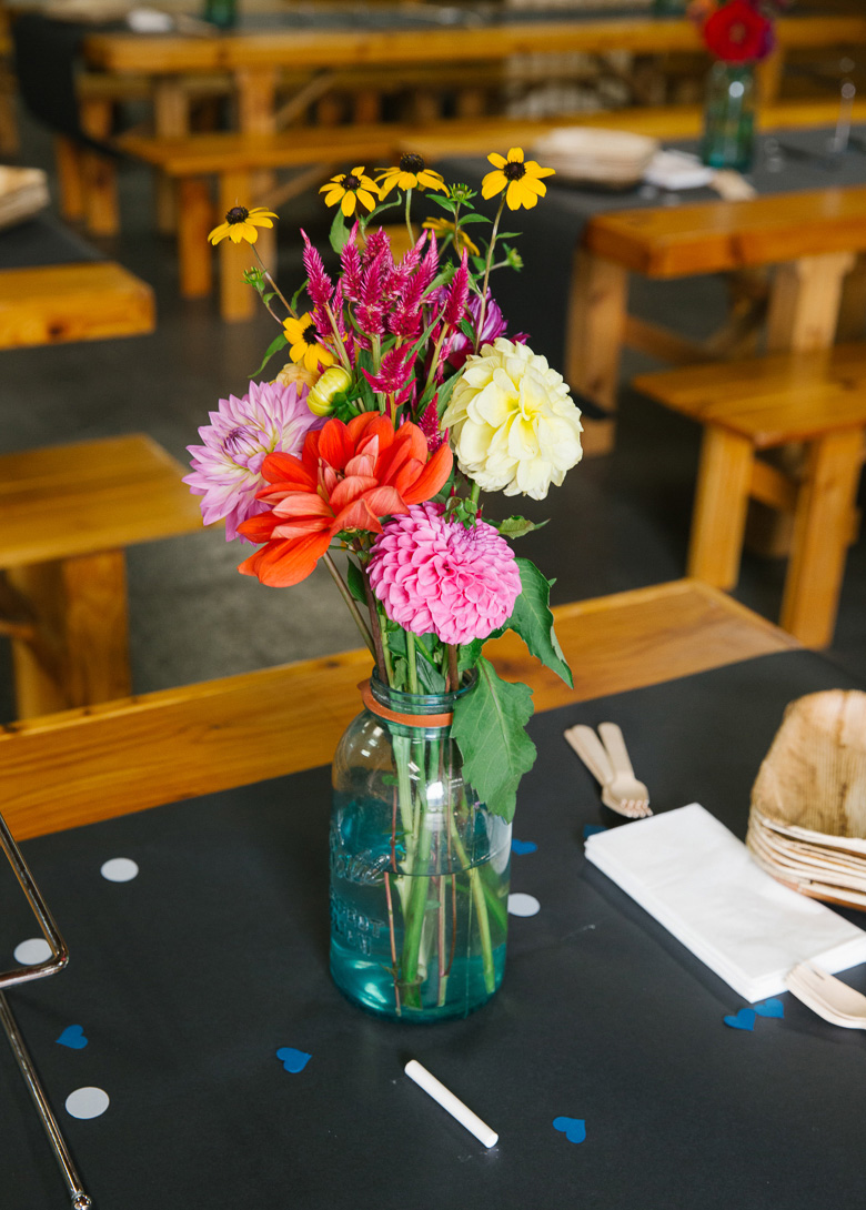 Within Sodo Seattle wedding reception details flowers