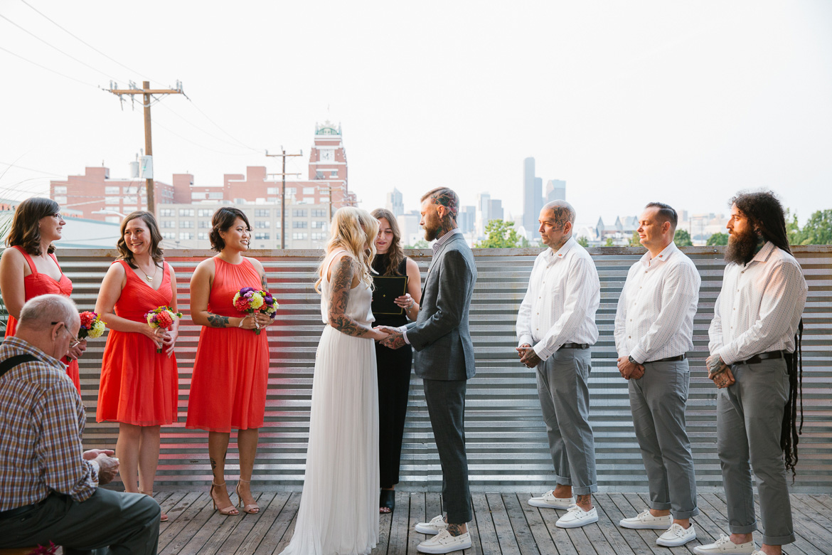 Within Sodo Seattle wedding ceremony bride groom