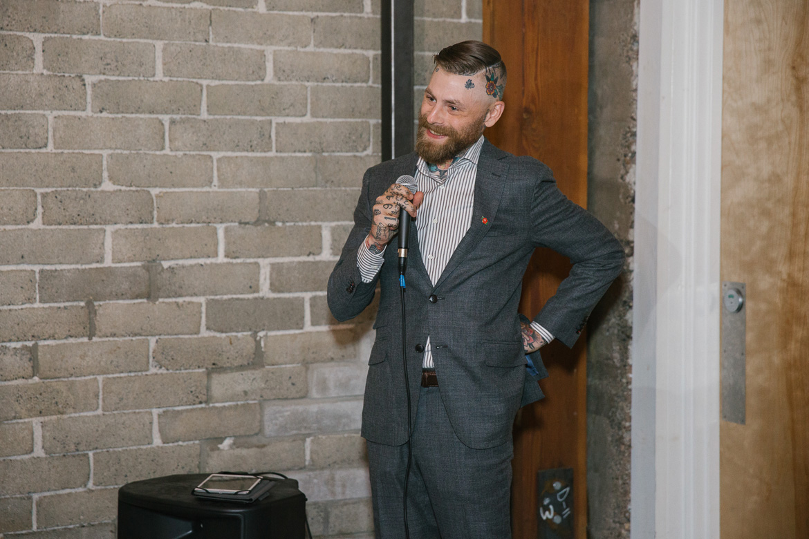 Within Sodo Seattle wedding reception toasts groom