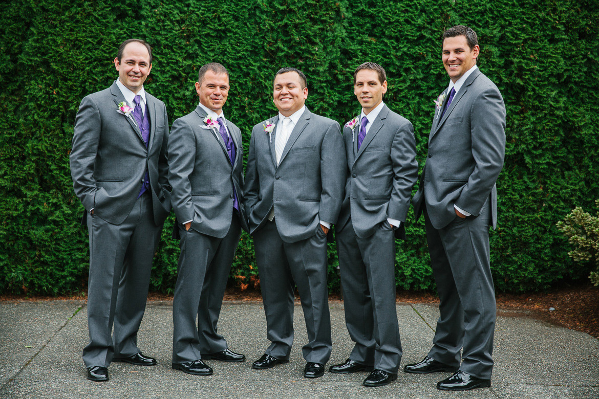 Groom and groomsmen during portraits at Columbia Winery wedding in Woodinville