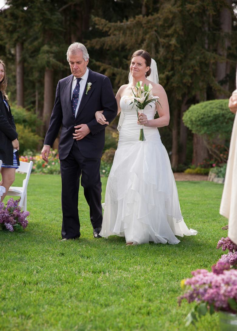 Bride walking down aisle at Fireseed Catering wedding on Whidbey Island, WA