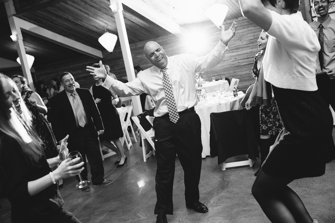 Guests dancing during wedding reception at Fireseed Catering on Whidbey Island, WA