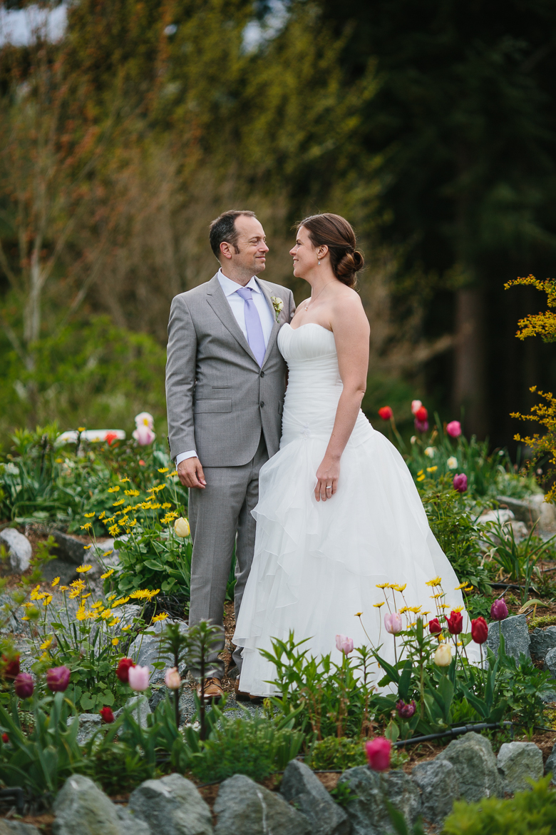Bride and groom sunset portraits in garden at Fireseed Catering wedding on Whidbey Island, WA 