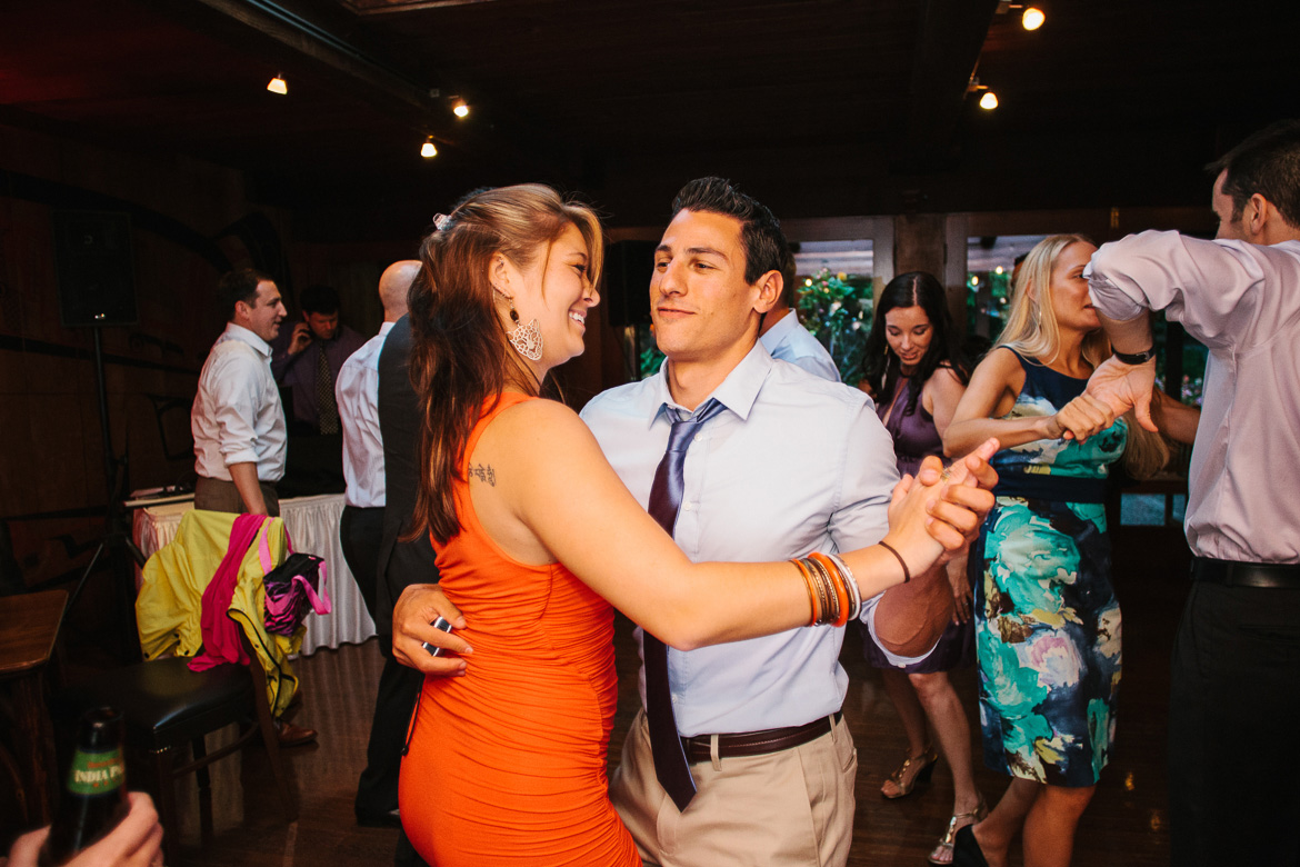 Guests dancing during wedding reception at Kiana Lodge in Poulsbo, WA