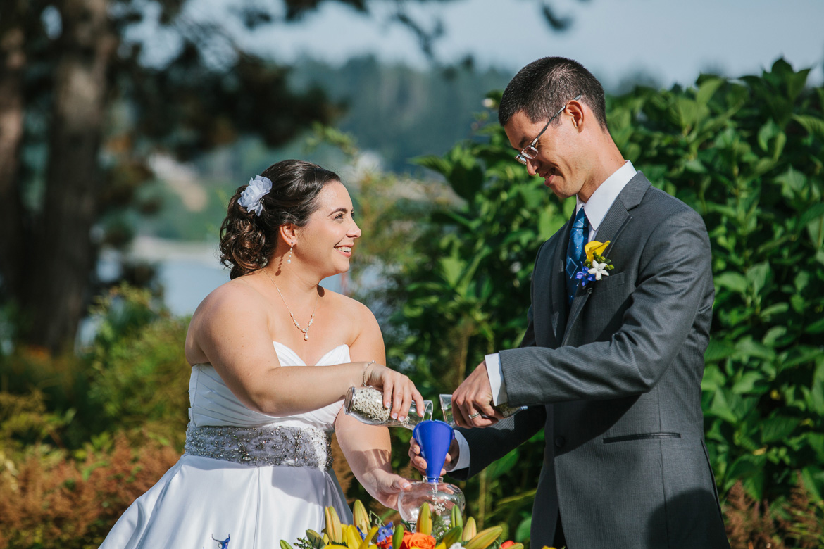 Bride and groom during wedding ceremony at Kiana Lodge in Poulsbo, WA