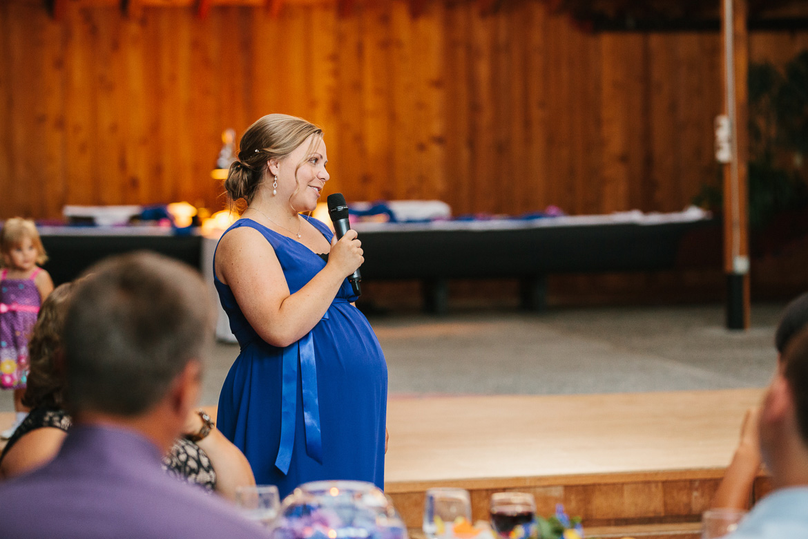 Maid of honor giving toasts during reception at Kiana Lodge wedding in Poulsbo, WA