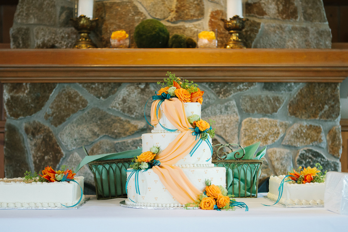 Reception cake details at summer wedding at Laurel Creek Manor in Sumner, WA