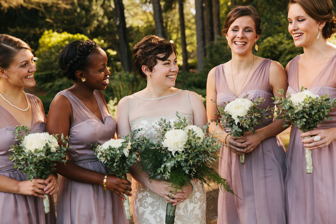 Bride with bridesmaids in Volunteer Park Seattle before wedding at Melrose Market Studios