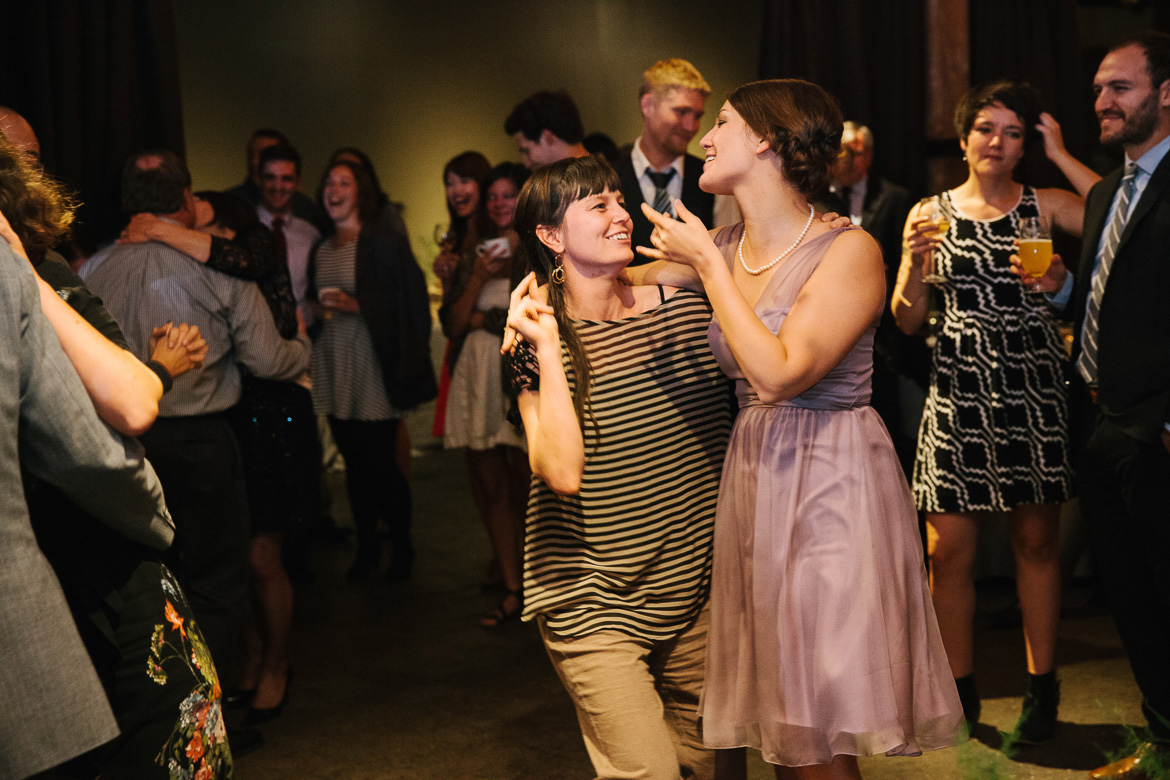 Guests dancing during reception at Melrose Market Studio wedding in Seattle, WA
