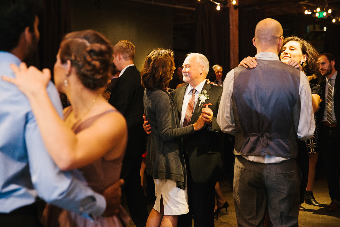 Guests dancing during reception at Melrose Market Studio wedding in Seattle, WA