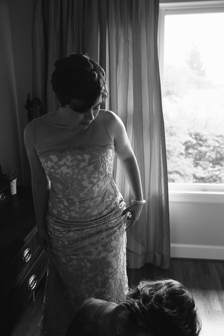 Bride getting ready with window light before Seattle, WA