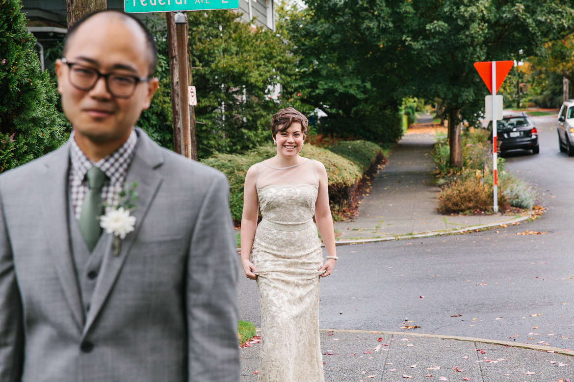 Bride and groom during first look before Melrose Market Studios wedding in Seattle, WA