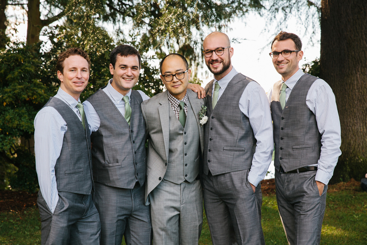Groom with groomsmen in Volunteer Park Seattle before wedding at Melrose Market Studios