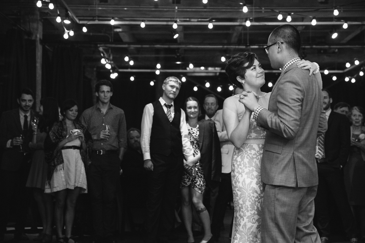 Bride and groom during first dance at Melrose Market Studios wedding in Seattle, WA