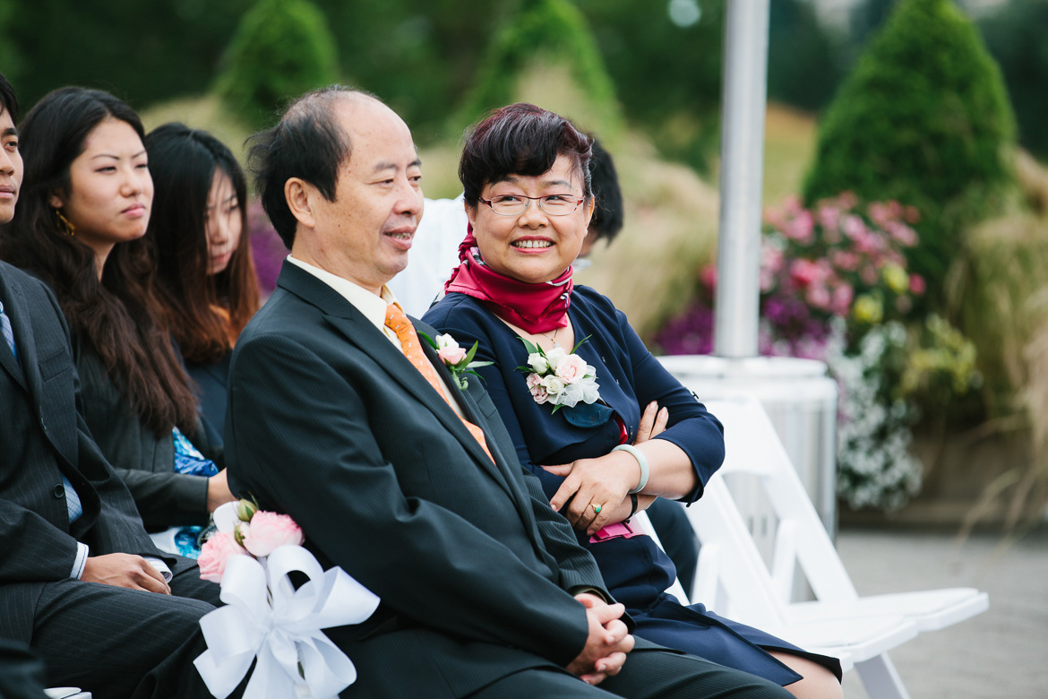 Parents during wedding ceremony at Newcastle Golf Course in Washington