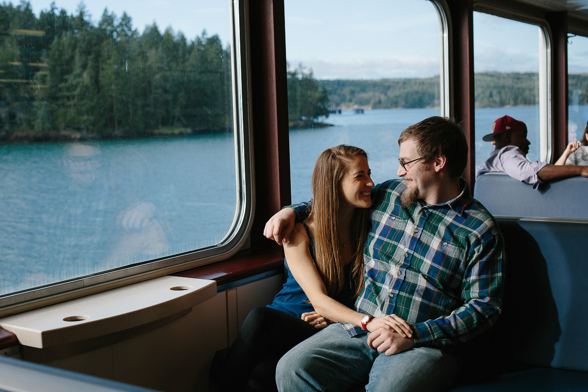 Couple on WA ferry to Orcas Island for engagement session 
