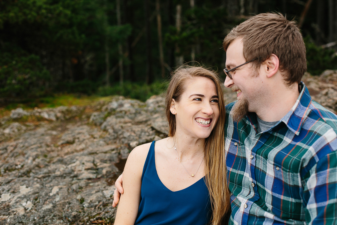 Couple laughing during engagement photo shoot on Mt Constitution 