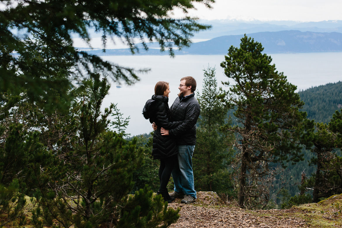Couple laughing during hike on Mt Constitution in the San Juan Islands