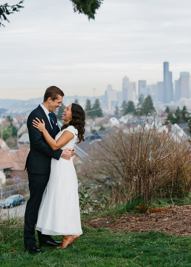 Bride and Groom laughing during portrait session at Jefferson Park on Beacon Hill in Seattle