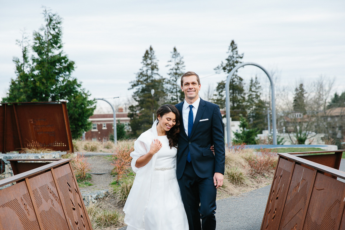 Bride and groom smiling during photo session on Beacon Hill in Seattle, Washington