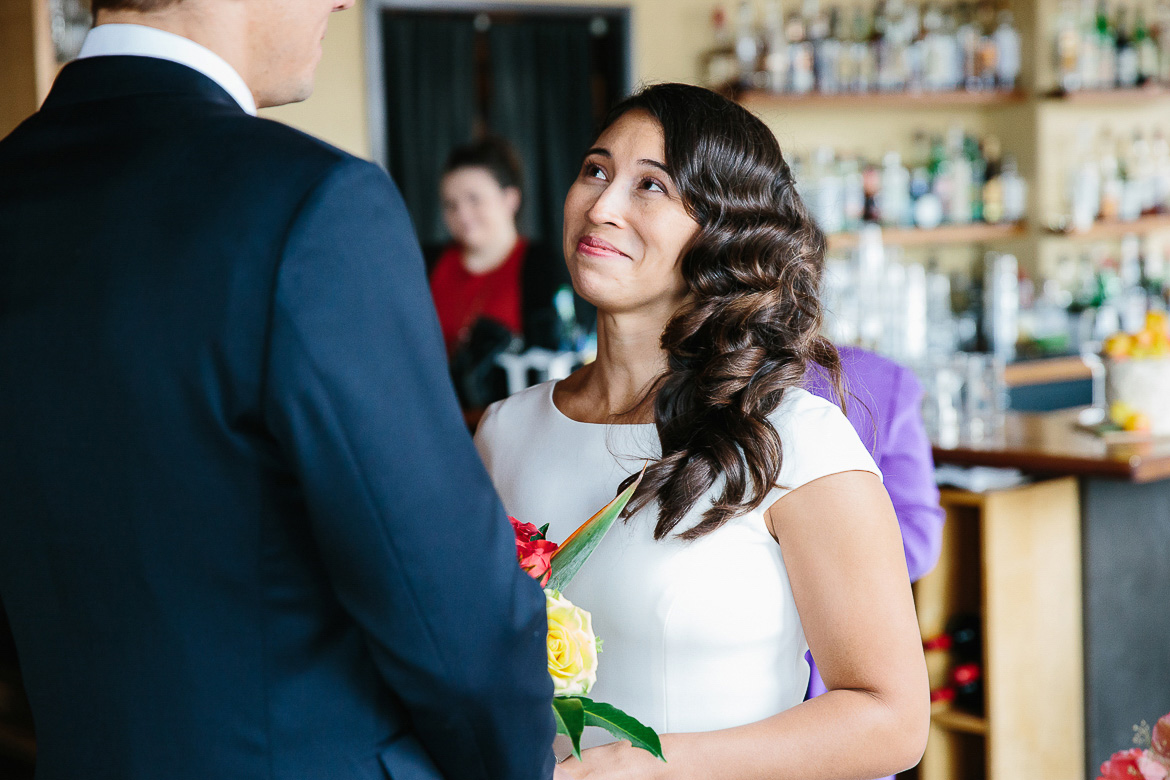Bride during elopement ceremony in Pike Place Market