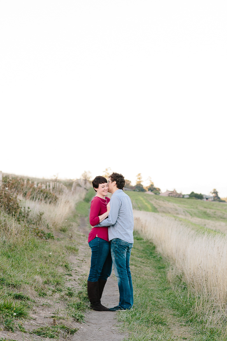 Bride laughing during engagement photo session on Whidbey Island